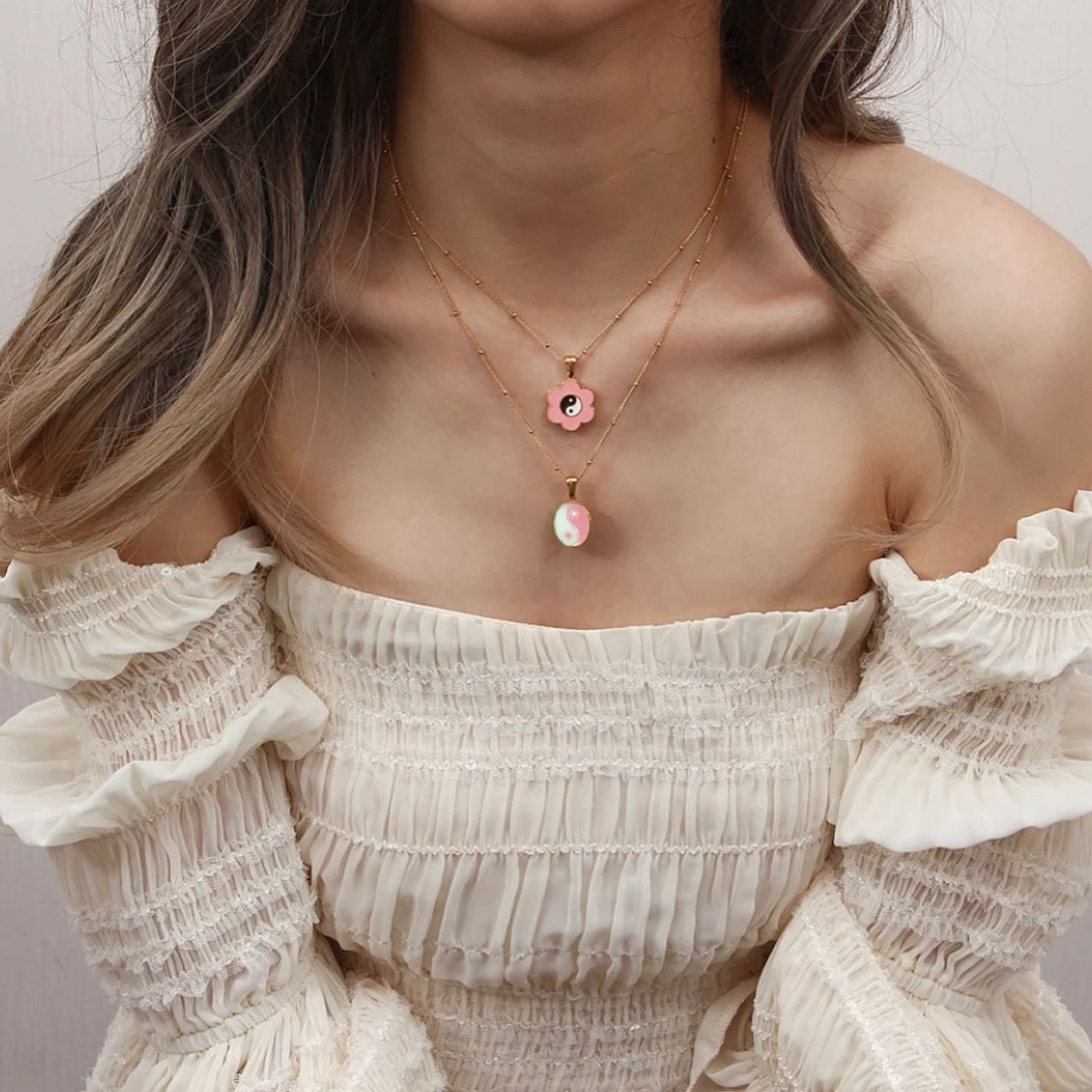 18k gold pink YY necklace.