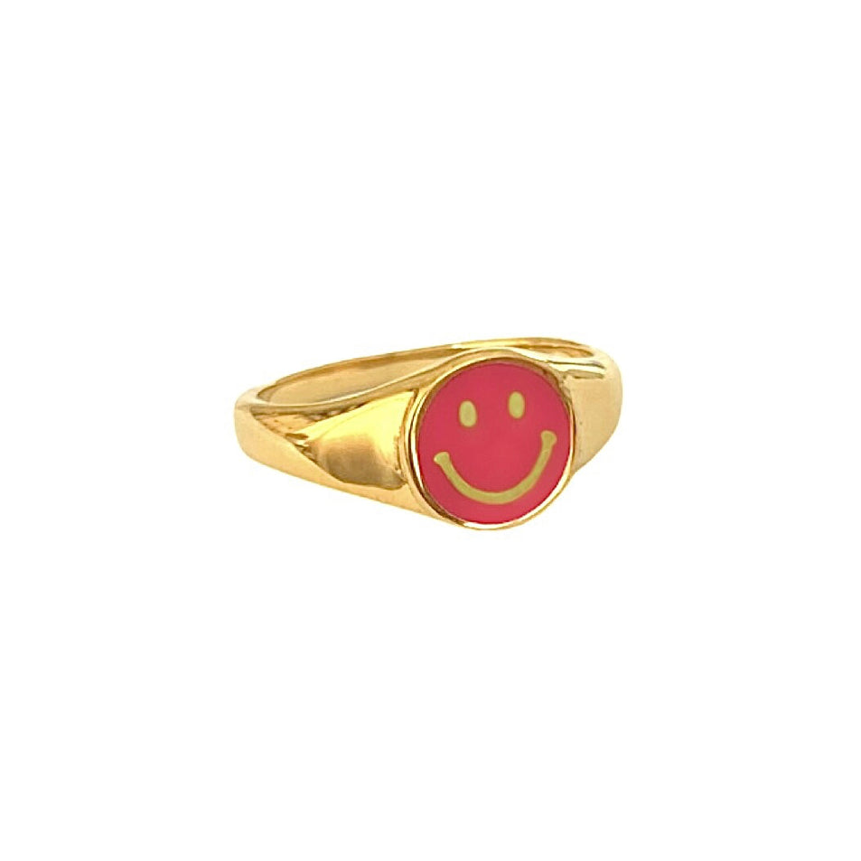 Pink smiley ring.